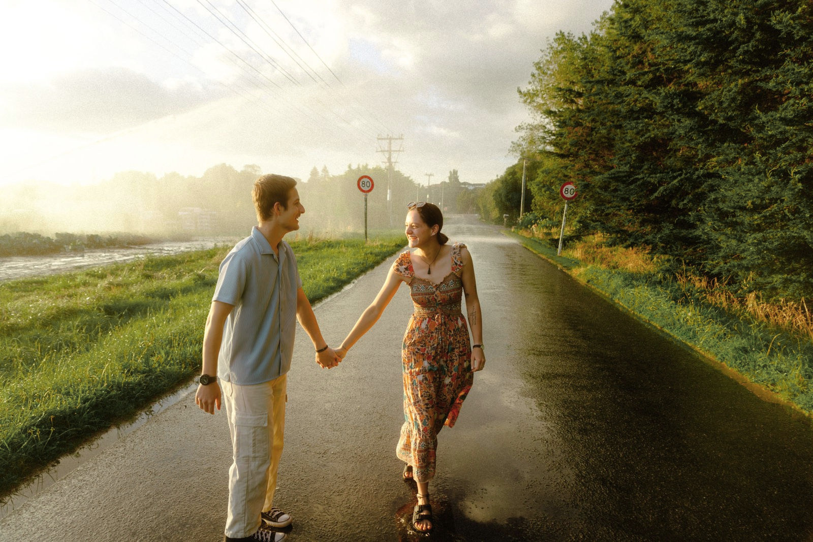 Engagement session on a golden-lit road