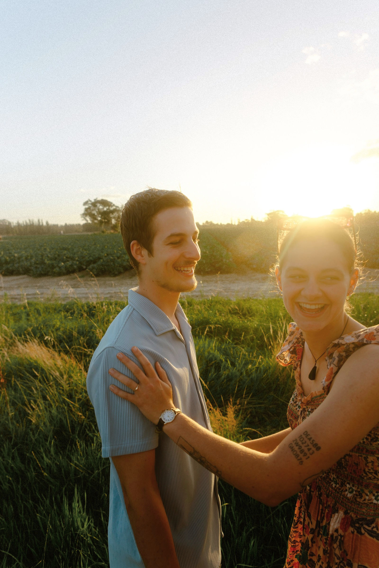 Couple embracing at golden hour