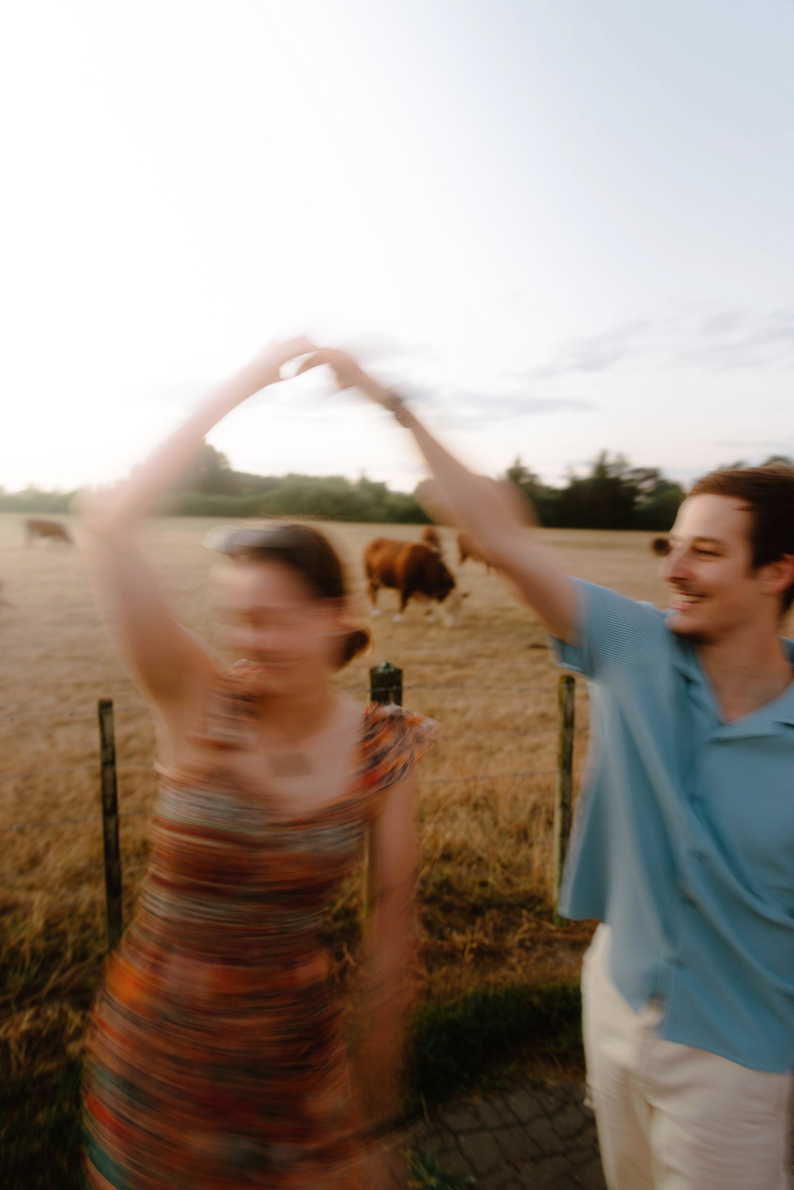 Couple dancing in a field