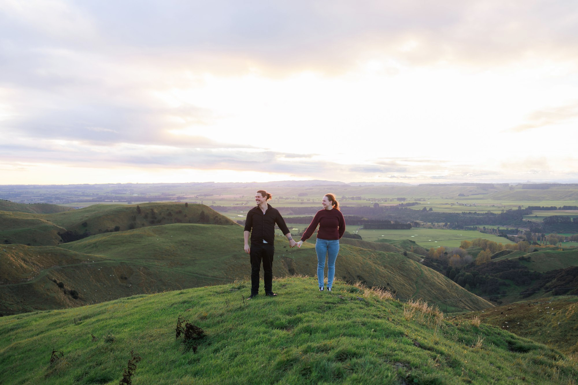 Couple on a hilltop at their engagement session