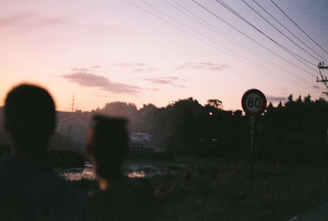 35mm film photograph, sunset silhouette