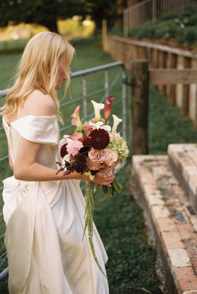 35mm film photograph of a bride with her bouquet