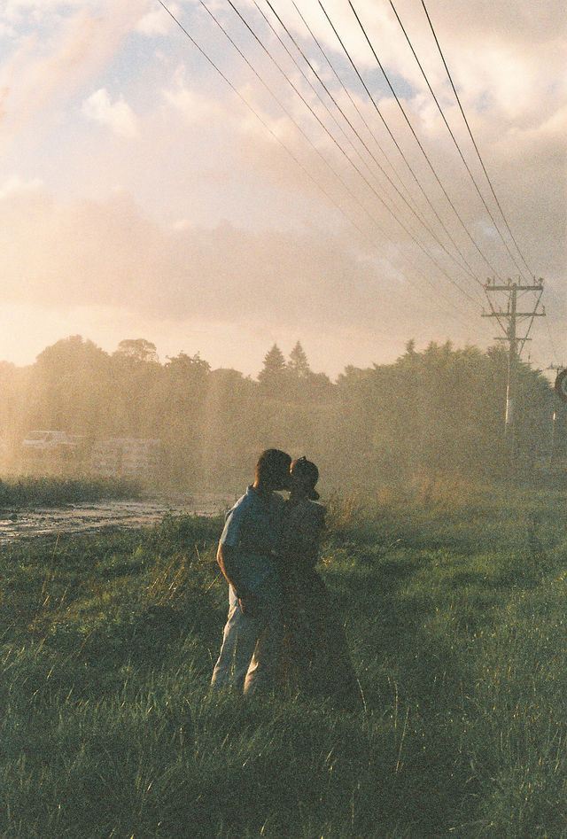 35mm film photograph of a couple at golden hour