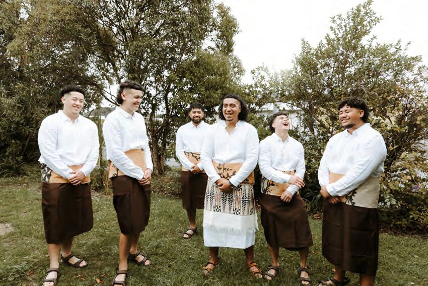 Wedding party by the barn