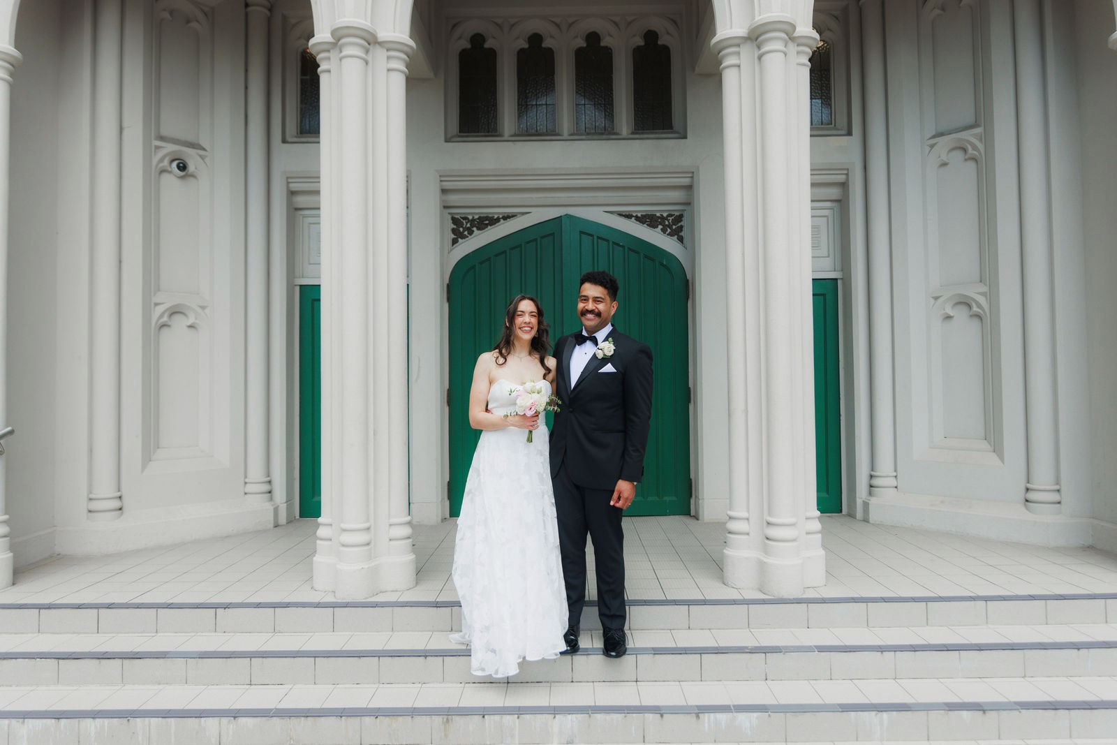 Couple at the cathedral doors